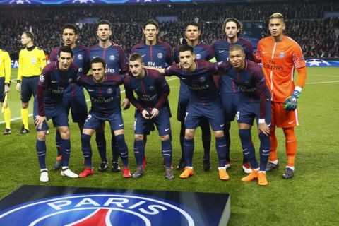 PSG's players pose for the photographers before the round of 16, 2nd leg Champions League soccer match between Paris Saint-Germain and Real Madrid at the Parc des Princes Stadium in Paris, Tuesday, March 6, 2018. (AP Photo/Francois Mori)