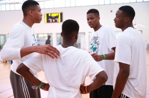 JOHANNESBURG, SA - JULY 28: Giannis, Kostas, Thanasis and Alex Antetokounmpo goes through some drill during a workout prior to the Basketball Without Boarders program on July 28, 2015 at the American International School of Johannesburg in Johannesburg, South Africa.  NOTE TO USER: User expressly acknowledges and agrees that, by downloading and or using this photograph, User is consenting to the terms and conditions of the Getty Images License Agreement. Mandatory Copyright Notice: Copyright 2015 NBAE  (Photo by Joe Murphy/NBAE via Getty Images)