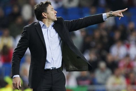 Real Sociedad's coach Philippe Montanier  gestures during a Spanish La Liga soccer match against Real Madrid at the Santiago Bernabeu stadium in Madrid, Spain, Saturday, March 24, 2012. (AP Photo/Andres Kudacki)