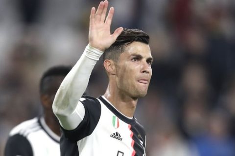 Juventus' Cristiano Ronaldo waves at the end of a Serie A soccer match between Juventus and Bologna, at the Allianz stadium in Turin, Italy, Saturday, Oct.19, 2019. (AP Photo/Luca Bruno)