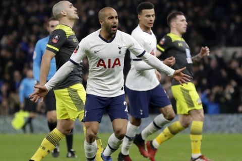 Tottenham's Lucas Moura celebrates after scoring his side's second goal during the English FA Cup fourth round replay soccer match between Tottenham Hotspur and Southampton at the Tottenham Hotspur Stadium in London, Wednesday, Feb. 5, 2020. (AP Photo/Kirsty Wigglesworth)