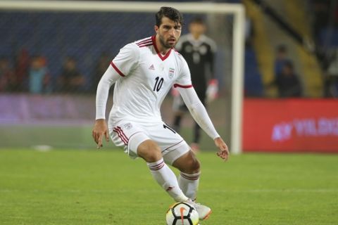 Iran's Karim Ansarifard during to a friendly soccer match between Turkey and Iran, in Istanbul, Monday, May 28, 2018. (AP Photo)