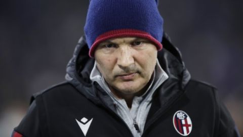 Bologna's head coach Sinisa Mihajlovic walks on the pitch prior to the start of a Serie A soccer match between Juventus and Bologna, at the Allianz stadium in Turin, Italy, Saturday, Oct.19, 2019. (AP Photo/Luca Bruno)