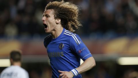 Chelsea's David Luiz celebrates after scoring a goal against Basel during their Europa League semifinal second leg soccer match, at Chelsea's Stamford Bridge stadium in London, Thursday, May  2, 2013. (AP Photo/Sang Tan)