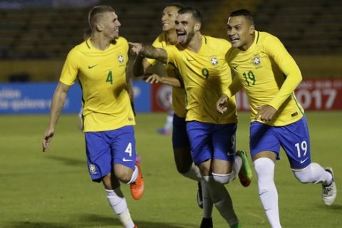 Brazil's Felipe Vizeu, center right, celebrates with his teammates Lyanco, from left, Richarlison and Leo Jaba, after scoring against Argentina in a U-20 South America qualifying soccer tournament for the 2017 South Korea U-20 World Cup, in Quito, Ecuador, Wednesday, Feb. 8, 2017. (AP Photo/Dolores Ochoa)