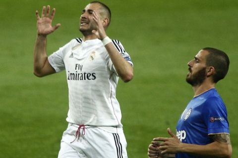 Real Madrid's Karim Benzema reacts during the Champions League second leg semifinal soccer match between Real Madrid and Juventus, at the Santiago Bernabeu stadium in Madrid, Wednesday, May 13, 2015.  (AP Photo/Oscar del Pozo)