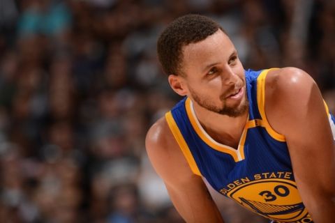 SAN ANTONIO, TX - MARCH 29: Stephen Curry #30 of the Golden State Warriors reacts to a play against the San Antonio Spurs during the game on March 29, 2017 at AT&T Center in San Antonio, Texas. NOTE TO USER: User expressly acknowledges and agrees that, by downloading and or using this photograph, user is consenting to the terms and conditions of Getty Images License Agreement. Mandatory Copyright Notice: Copyright 2017 NBAE (Photo by Noah Graham/NBAE via Getty Images)