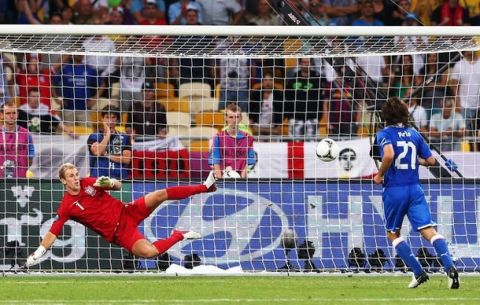KIEV, UKRAINE - JUNE 24:  Andrea Pirlo of Italy chips the ball in the penalty shootout past Joe Hart of England during the UEFA EURO 2012 quarter final match between England and Italy at The Olympic Stadium on June 24, 2012 in Kiev, Ukraine.  (Photo by Alex Livesey/Getty Images)