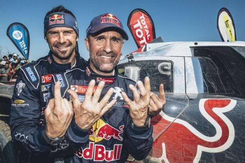 Stephane Peterhansel (FRA)  and Cyril Despres (FRA) from Team Peugeot Total  at the finish line of stage 13 of Rally Dakar 2016 from Villa Carlos Paz to Rosario, Argentina on January 16, 2016.