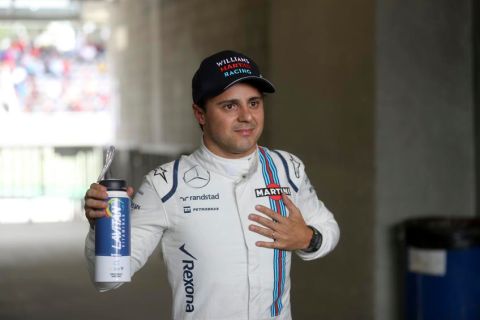 Williams driver Felipe Massa, of Brazil, gestures after the qualifying session for the Brazilian Formula One Grand Prix at at the Interlagos race track in Sao Paulo, Brazil, Saturday, Nov. 12, 2016. (AP Photo/Andre Penner)