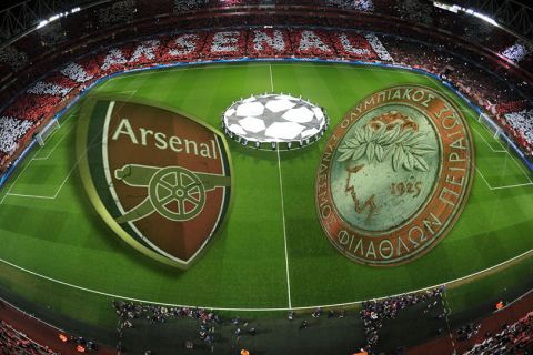 LONDON, ENGLAND - FEBRUARY 19:  The Arsenal and Bayern Munich teams line up before the UEFA Champions League match between Arsenal and FC Bayern Muenchen at Emirates Stadium on February 19, 2014 in London, England.  (Photo by Stuart MacFarlane/Arsenal FC via Getty Images) *** Local Caption *** Emirates Stadium;Arsenal team;Bayern Munich team