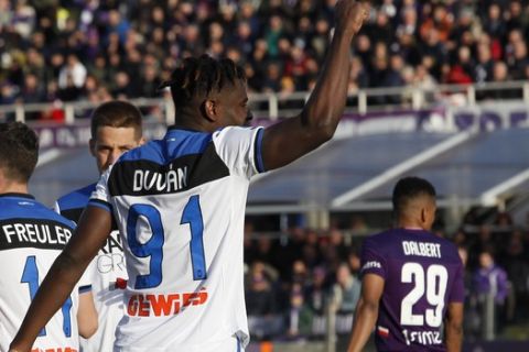Atalanta's Duvan Zapata celebrates after scoring his side's first goal during the Italian Serie A soccer match between Fiorentina and Atalanta, at the Artemio Franchi stadium in Florence, Italy, Saturday, Feb. 8, 2020. (Marco Bucco/LaPresse via AP)