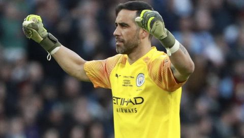 Manchester City's goalkeeper Claudio Bravo reacts after his team scored it's second goal during the League Cup soccer match final between Aston Villa and Manchester City, at Wembley stadium, in London, England, Sunday, March 1, 2020. (AP Photo/Ian Walton)