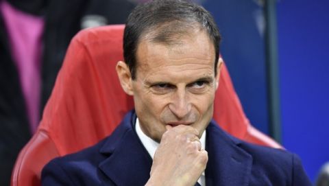 FILE - In this Wednesday, April 10, 2019 filer, Juventus coach Massimiliano Allegri stands on the touchline before the Champions League quarterfinal, first leg, soccer match between Ajax and Juventus at the Johan Cruyff ArenA in Amsterdam, Netherlands.  Juventus has announced that coach Massimiliano Allegri is leaving at the end of the season.
A brief club statement says, Massimiliano Allegri will not be on the Juventus bench for the 2019/2020 season, adding that Allegri and Juventus president Andrea Agnelli will hold a joint press conference on Saturday. (AP Photo/Martin Meissner, File)
