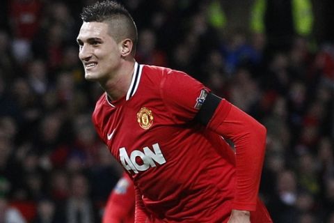 Manchester United's Federico Macheda reacts after scoring a penalty against Crystal Palace during their English League Cup soccer match at Old Trafford Stadium, Manchester, England, Wednesday Nov. 30, 2011. (AP Photo/Jon Super)