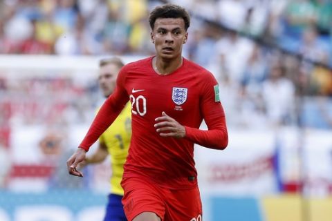 England's Dele Alli controls the ball during the quarterfinal match between Sweden and England at the 2018 soccer World Cup in the Samara Arena, in Samara, Russia, Saturday, July 7, 2018. (AP Photo/Alastair Grant)