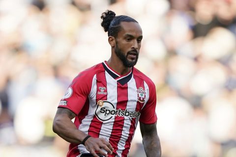 Southampton's Theo Walcott in action during an English Premier League soccer match against Leeds United at St. Mary's Stadium in Southampton, England, Saturday, Oct. 16, 2021. Southampton won 1-0. (AP Photo/Steve Luciano)
