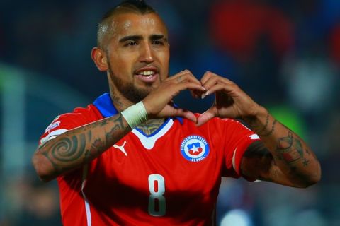 SANTIAGO, CHILE - JUNE 11: Arturo Vidal of Chile celebrates after scoring the opening goal through a penalty kick during the 2015 Copa America Chile Group A match between Chile and Ecuador at Nacional Stadium on June 11, 2015 in Santiago, Chile. (Photo by Miguel Tovar/LatinContent/Getty Images) 