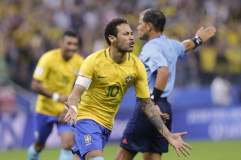 Brazil's Neymar celebrates scoring his side's 2nd goal against Paraguay during a 2018 World Cup qualifying soccer match at the Arena Corinthians Stadium in Sao Paulo, Brazil, Tuesday, March 28, 2017. (AP Photo/Nelson Antoine)