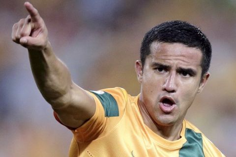 FILE - In this March 26, 2013, file photo, Australia's Tim Cahill reacts after scoring against Oman during their World Cup Asian qualifying soccer match at the Olympic Stadium in Sydney, Australia. Australian striker Cahill announced on Tuesday, July 17, 2018, his retirement from international football aged 38 and after his fourth World Cup. (AP Photo/Rick Rycroft, File)