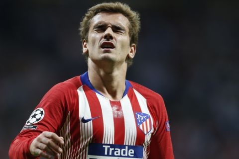 Atletico forward Antoine Griezmann reacts during a Group A Champions League soccer match between Atletico Madrid and Club Brugge at the Wanda Metropolitano stadium in Madrid, Spain, Wednesday Oct. 3, 2018. (AP Photo/Paul White)
