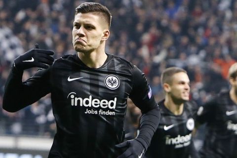 Frankfurt's Luka Jovic celebrates his side's opening goal during a Europa League group H soccer match between Eintracht Frankfurt and Olympique Marseille in Frankfurt, Germany, Thursday, Nov. 29, 2018. (AP Photo/Michael Probst)
