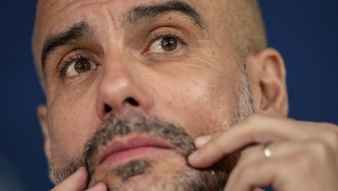 Manchester City head coach Pep Guardiola attends a press conference in Madrid, Spain, Tuesday, Feb. 25, 2020. Real Madrid will play against Manchester City in a Champions League soccer match on Wednesday. (AP Photo/Bernat Armangue)