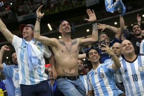 Argentina fans cheer prior to the international friendly soccer match between Spain and Argentina at the Wanda Metropolitano stadium in Madrid, Spain, Tuesday, March 27, 2018. (AP Photo/Francisco Seco)