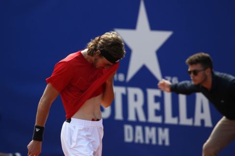 Greece's Stefanos Tsitsipas wipes his forehead during the Barcelona Open Tennis Tournament final with Spain's Rafael Nadal in Barcelona, Spain, Sunday, April 29, 2018. (AP Photo/Manu Fernandez)