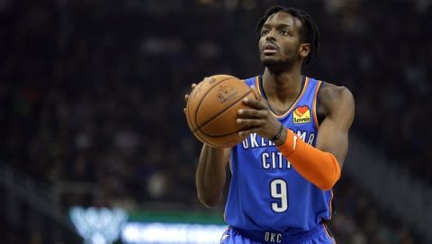 Oklahoma City Thunder's Jerami Grant shoots a free throw during the first half of an NBA basketball game against the Milwaukee Bucks Wednesday, April 10, 2019, in Milwaukee. (AP Photo/Aaron Gash)
