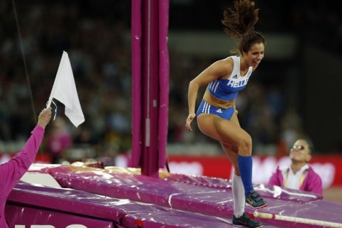 Greece's Ekaterini Stefanidi celebrates winning the gold medal in the Women's Pole Vault during the World Athletics Championships in London Sunday, Aug. 6, 2017. (AP Photo/Alastair Grant)