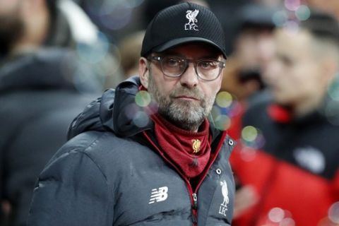 Liverpool's manager Jurgen Klopp looks on before the English Premier League soccer match between West Ham Utd and Liverpool at the London Stadium in London, Wednesday, Jan. 29, 2020. (AP Photo/Frank Augstein)
