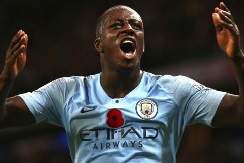 Manchester City's Benjamin Mendy reacts during the English Premier League soccer match between Manchester City and Manchester United at the Etihad stadium in Manchester, England, Sunday, Nov. 11, 2018. (AP Photo/Dave Thompson)