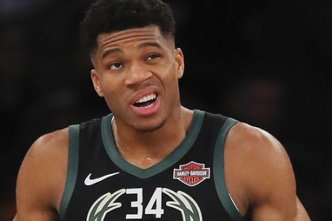 Milwaukee Bucks forward Giannis Antetokounmpo (34) reacts during the second quarter of an NBA basketball game against the New York Knicks, Saturday, Dec. 1, 2018, in New York. (AP Photo/Julie Jacobson)