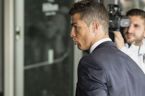 Real Madrid's Cristiano Ronaldo arrives at at the team hotel in Munich, southern Germany, Tuesday, April 11, 2017 one day before the Champions League first leg quarterfinal soccer match between Bayern Munich and Real Madrid. (Matthias Balk/dpa via AP)