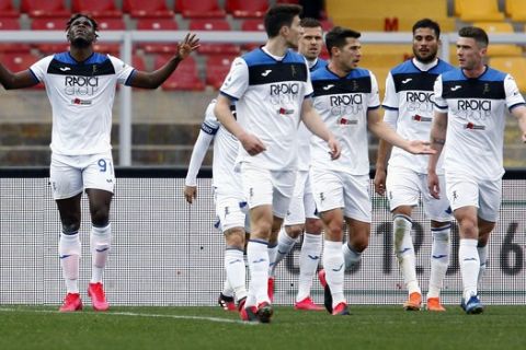 Atalanta's Duvan Zapata, left, celebrates after scoring his side's opening goal during the Serie A soccer match between Lecce and Atalanta, at the Via del Mare Stadium in Lecce, Italy, Sunday, March 1, 2020. (Donato Fasano/LaPresse via AP)