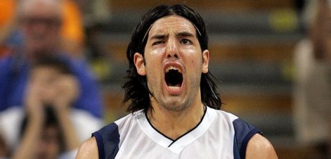 Argentina's Luis Scola reacts after scoring against the USA in the second half of their men's basketball semi final game at the Olympic Indoor Hall during the 2004 Olympic Games in Athens, Greece on Friday, Aug. 27, 2004. (AP Photo/Michael Conroy)