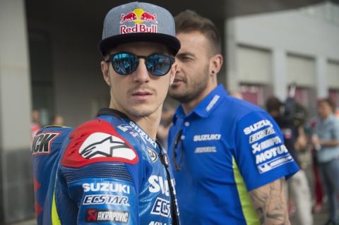 DOHA, QATAR - MARCH 17:  Maverick Vinales of Spain and Team Suzuki ECSTAR  looks on before the official photo of the 2016 MotoGP riders during the MotoGp of Qatar - Free Practice at Losail Circuit on March 17, 2016 in Doha, Qatar.  (Photo by Mirco Lazzari gp/Getty Images)