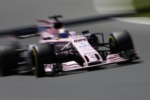 Force India driver Sergio Perez of Mexico steers his car during the third practice session for the Spanish Formula One Grand Prix at the Barcelona Catalunya racetrack in Montmelo, Spain, Saturday, May 13, 2017. The F1 race will be held on Sunday. (AP Photo/Emilio Morenatti)
