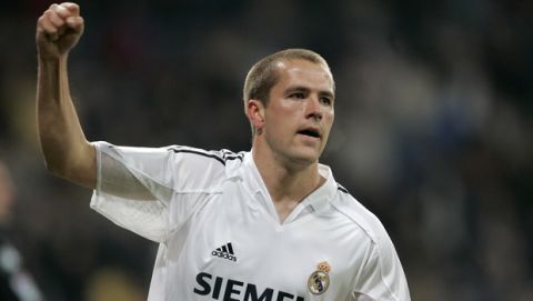 English Real Madrid player Michael Owen celebrates his goal during his Spanish league soccer match against Betis in Madrid, Wednesday, March 2, 2005. (AP Photo/Jasper Juinen) ** EFE OUT **