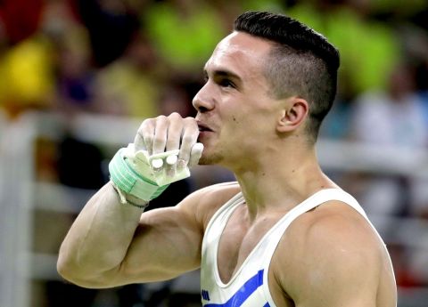 Greece's Eleftherios Petrounias celebrates after his performance on the rings during the artistic gymnastics men's apparatus final at the 2016 Summer Olympics in Rio de Janeiro, Brazil, Monday, Aug. 15, 2016. (AP Photo/Rebecca Blackwell) 