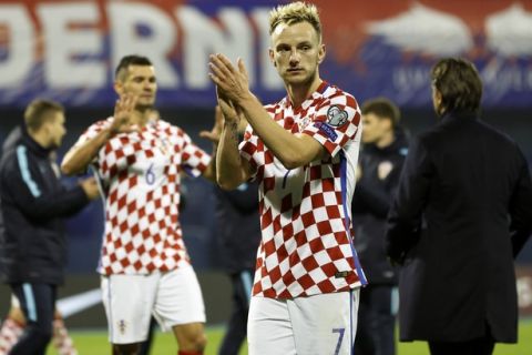 Croatia's Ivan Rakitic waves to the fans after the World Cup qualifying play-off first leg soccer match between Croatia and Greece at Maksimir Stadium in Zagreb, Thursday Nov. 9, 2017. Croatia won 4-1. (AP Photo/Darko Bandic)