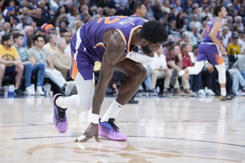 Phoenix Suns center Deandre Ayton (22) in the first half of Game 5 of an NBA basketball semifinal playoff series Tuesday, May 9, 2023, in Denver. (AP Photo/David Zalubowski)