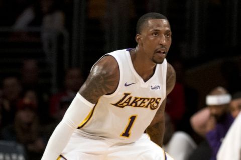 Los Angeles Lakers guard Kentavious Caldwell-Pope (1) during the second half of an NBA basketball game, Sunday, Dec. 3, 2017, in Los Angeles. (AP Photo/Kyusung Gong)