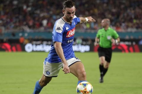 Napoli midfielder Fabian Ruiz runs with the ball during the first half of a LaLiga-Serie A Cup soccer match against Barcelona, Wednesday, Aug. 7, 2019, in Miami Gardens, Fla. (AP Photo/Lynne Sladky)