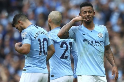 Manchester City's Gabriel Jesus celebrates scoring his side's second goal of the game during the English Premier League soccer match between Manchester City and Huddersfield Town at the Etihad Stadium in Manchester, England, Sunday, Aug. 19, 2018. (AP Photo/Dave Thompson)