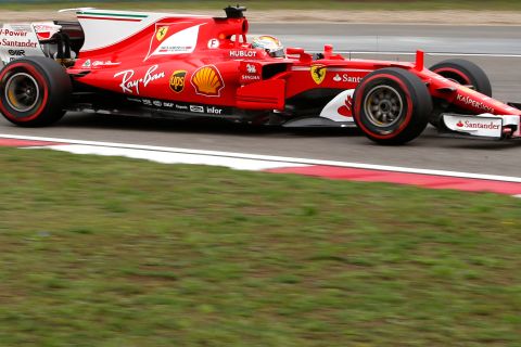 Ferrari driver Sebastian Vettel of Germany steers his car during the third practice session for the Chinese Formula One Grand Prix at the Shanghai International Circuit in Shanghai, China, Saturday, April 8, 2017. (AP Photo/Toru Takahashi)