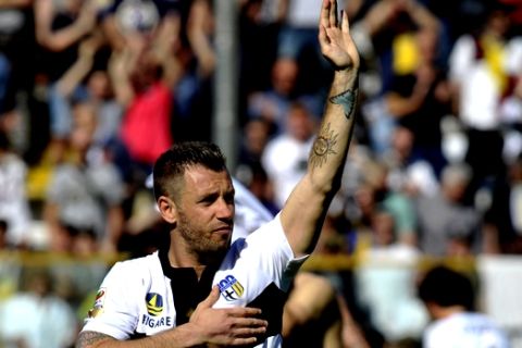 Parma's Antonio Cassano waves to supporters at the end of Serie A soccer match against Sampdoria, at Parma's Tardini stadium, Italy, Sunday, May 4, 2014. Parma won 2-0. (AP Photo/Marco Vasini)