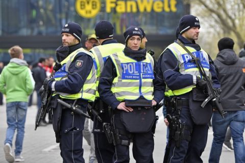 Police secures the place in front of the stadium prior the Champions League first leg quarterfinal soccer match between Borussia Dortmund and AS Monaco in Dortmund, Germany, Wednesday, April 12, 2017. (AP Photo/Martin Meissner)