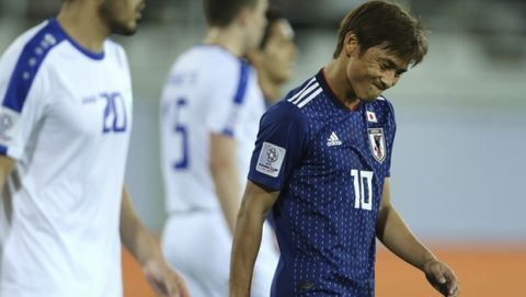 Japan's Shoya Nakajima reacts during the AFC Asian Cup group F soccer match between Japan and Uzbekistan at Khalifa bin Zayed Stadium in Al Ain, United Arab Emirates, Thursday, Jan. 17, 2019. (AP Photo/Kamran Jebreili)